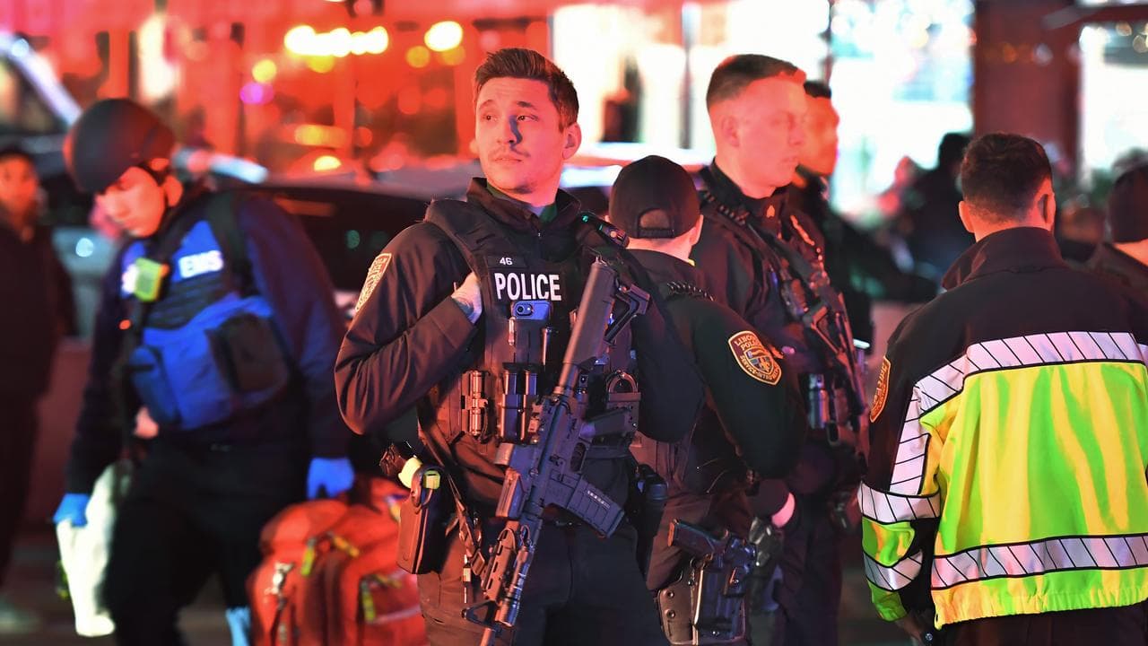 Law enforcement officials gather near Brown University