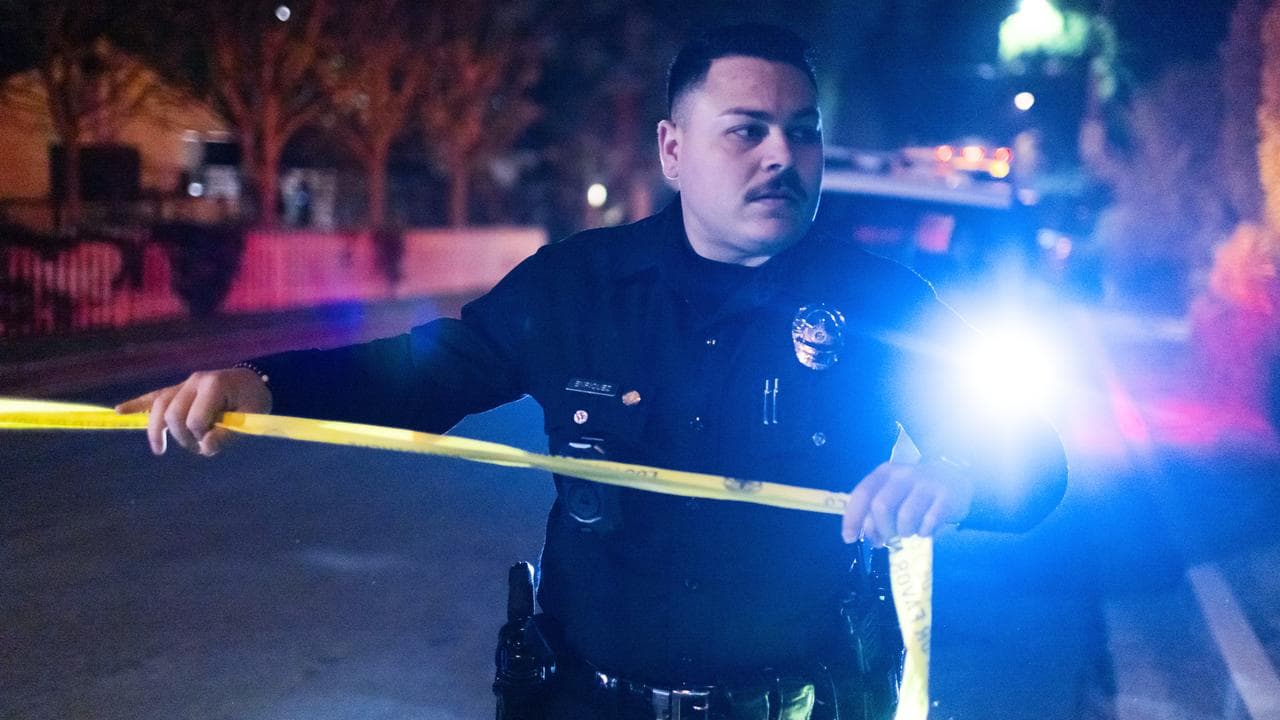 A police office blocks off a street near Rob Reiner's residence