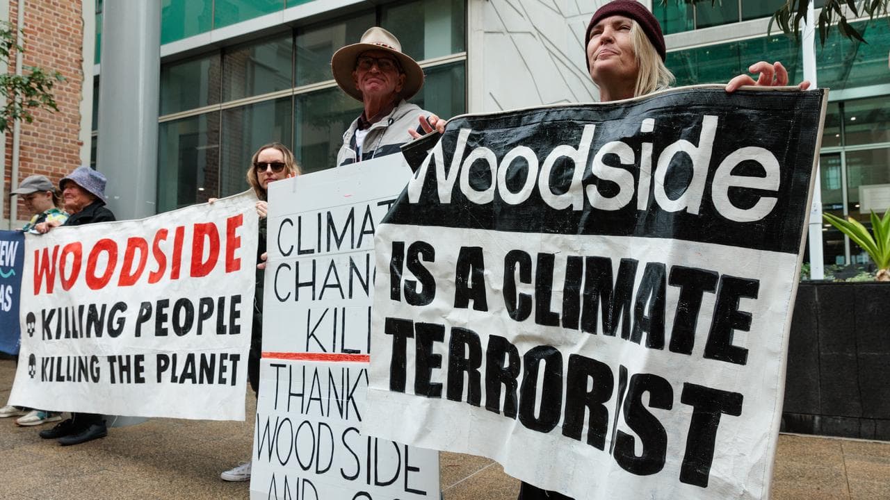 Protesters outside Woodside's Perth HQ in May.