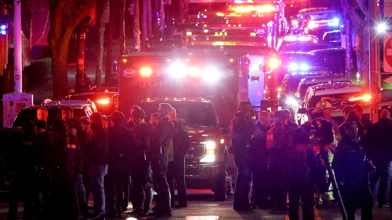 Emergency personnel gather on Waterman Street at Brown University