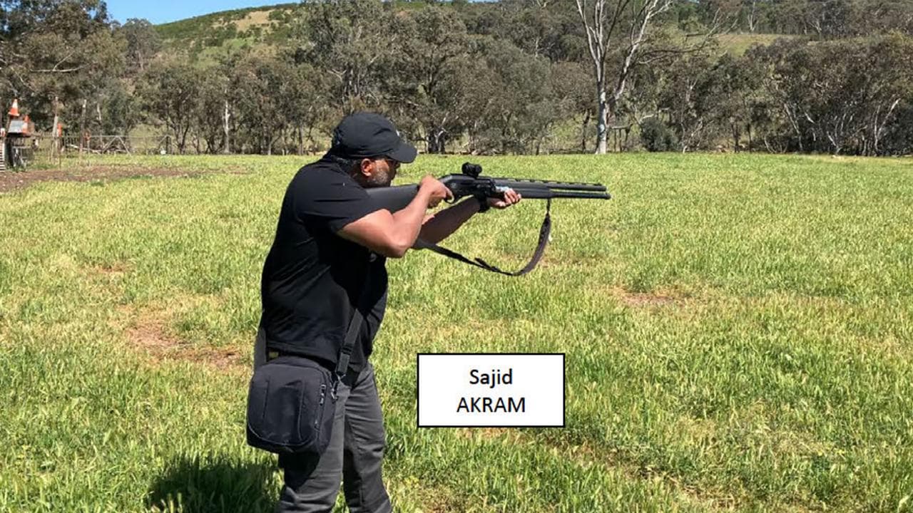 Sajid Akram points gun in countryside