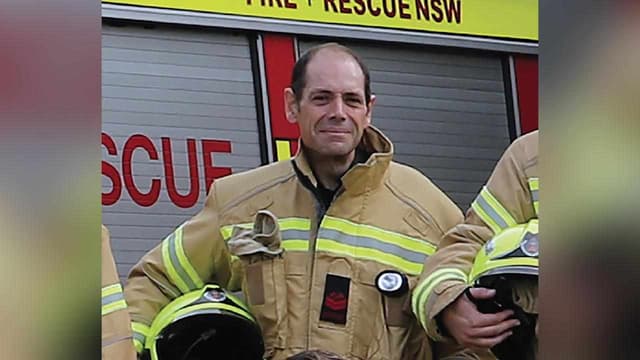 Firefighter killed in burning home identified