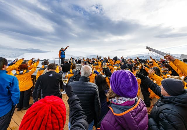 Quark Expeditions Invites Guests to "Raise a Glass and Stay Connected" with Free Wi-Fi and Bar Service