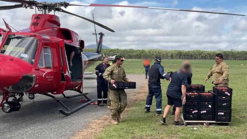 Hopes fade for missing man as flood bears down on town