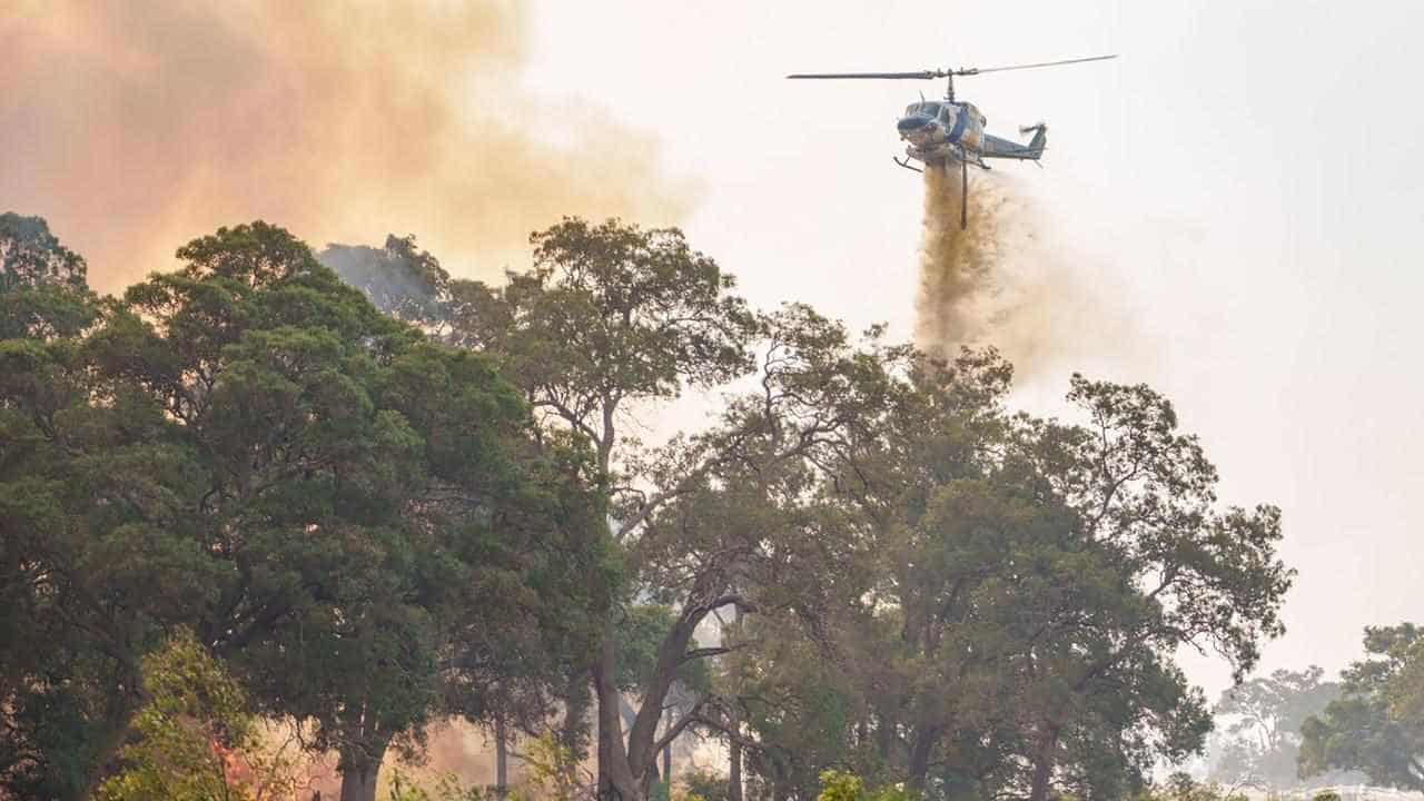 Heatwave continues in WA as firefighters battle on