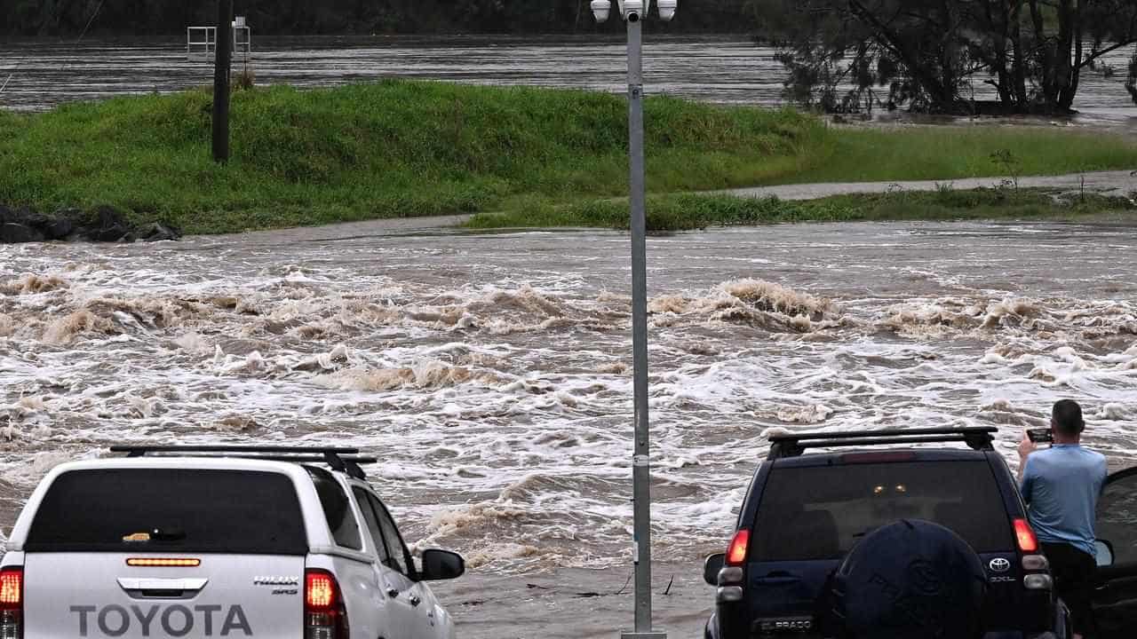 Heavy rain, flood threat dampen start to new year