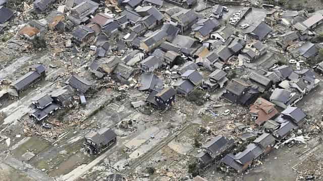 Japan quake toll nears 50, race to find survivors