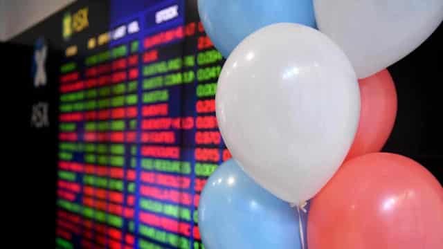 Australian shares start year fraction from record high