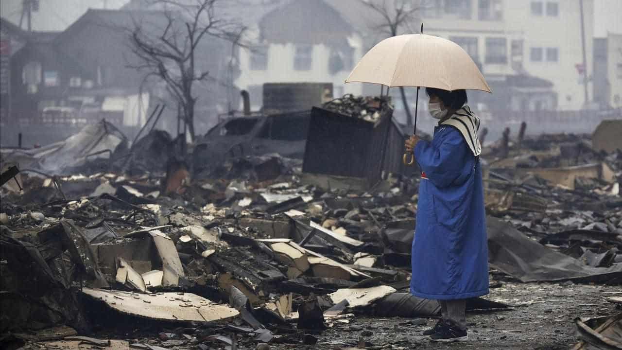 Japan quake rescuers race against time to aid survivors