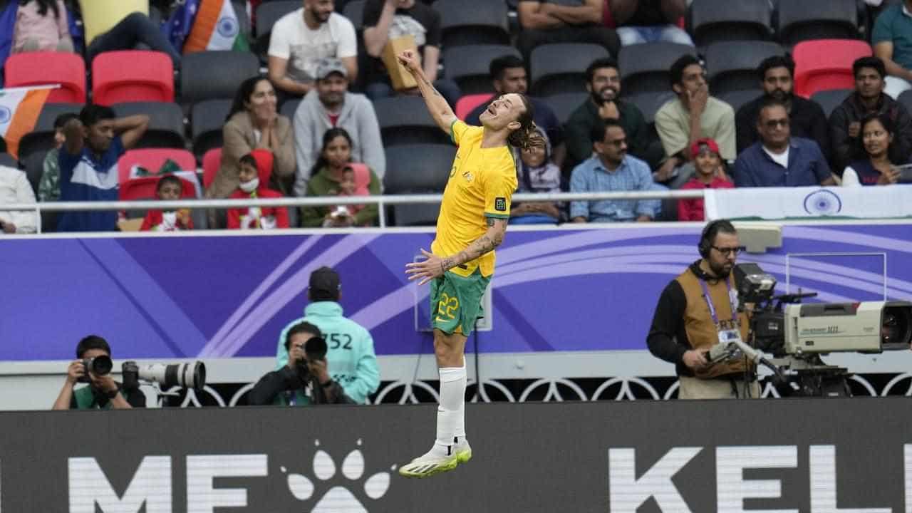 Underwhelming Socceroos grind past India in Asian Cup