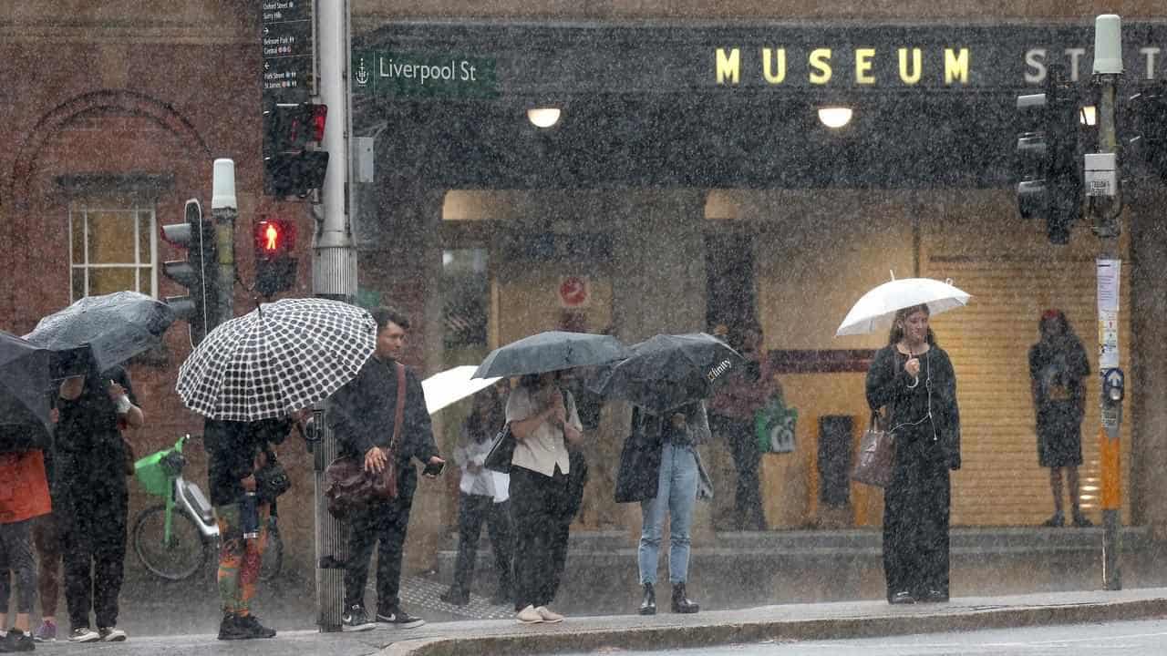 Hundreds of emergency calls as Sydney lashed with rain