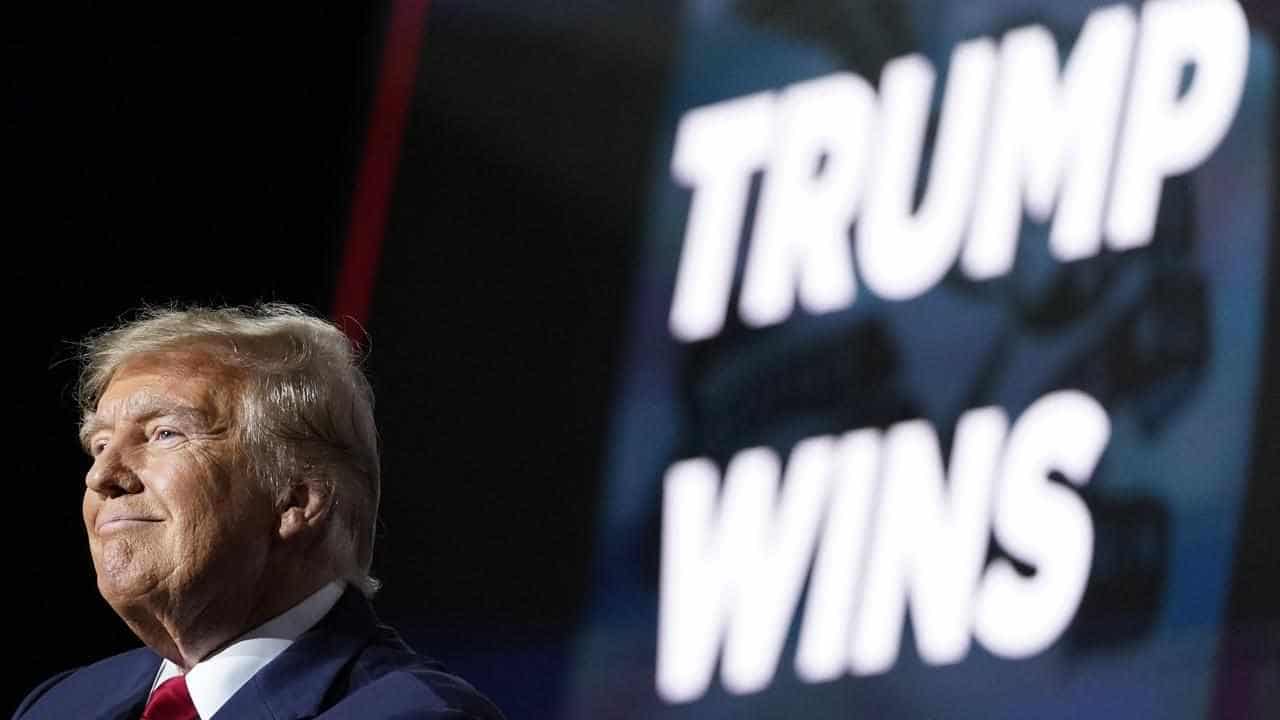 Trump cements frontrunner status with record Iowa win