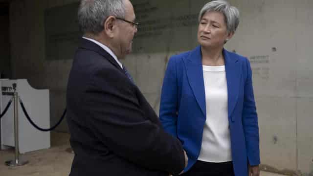 Debate simmers as Wong returns from Middle East mission