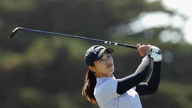 Malaysian golfer Ashley Lau salutes at the Vic Open