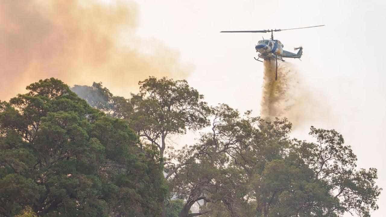 Firefighting water bombers drop sewage water onto homes