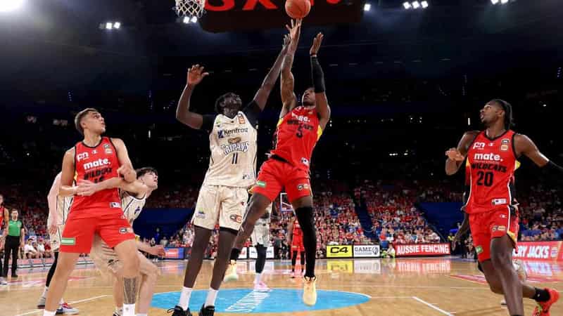 Wildcats lock in NBL top-two spot with win over Taipans