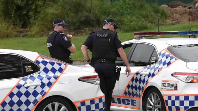 Police officer slashed with knife in Queensland