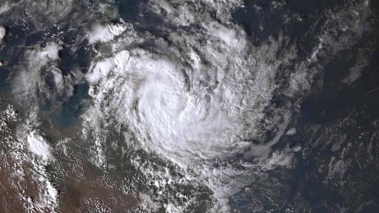 Flood-hit regions brace after cyclone warning issued