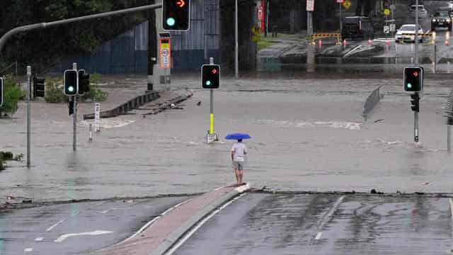 Heavy rain causes floods as tropical cyclone looms