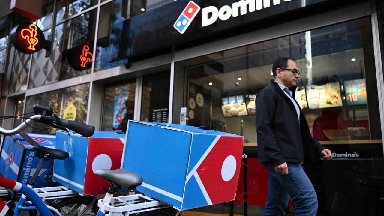 Domino's half-year profit drops 19pct, dividend cut