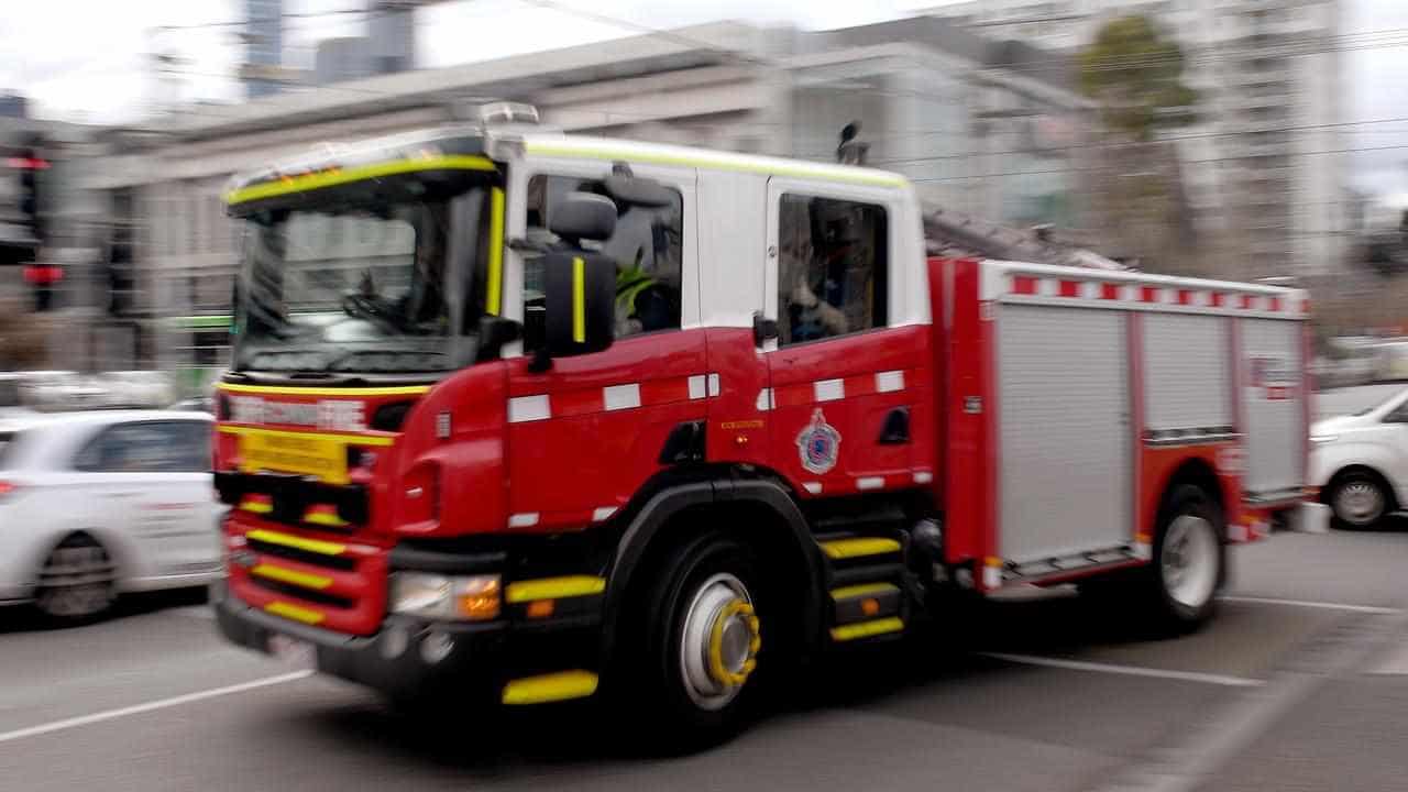 Arsonist hunt after two die in 'targeted' shop fire