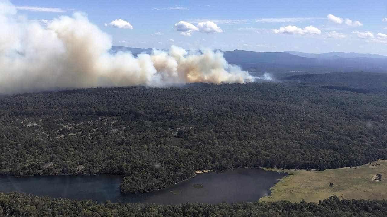 Firefighters battle to control three remote bushfires