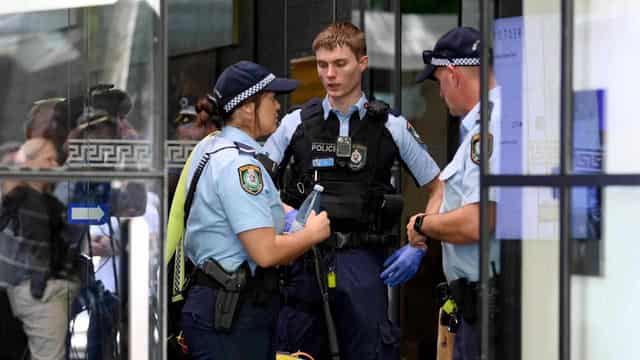 'Brave' office workers hold down elderly Sydney shooter