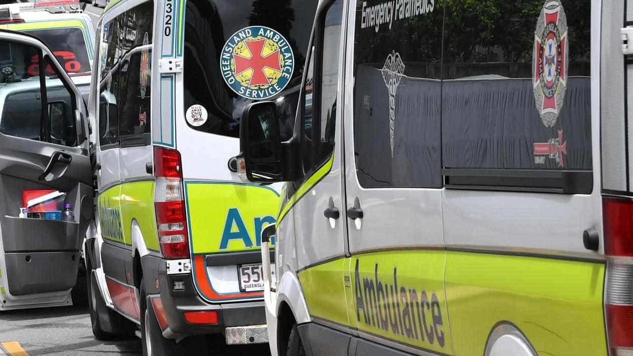 Two people charged after 'disgusting' ambulance attack