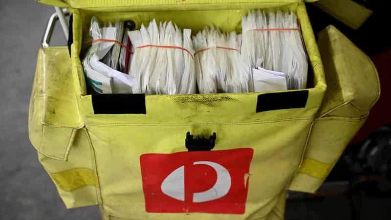 Falling letters, shop traffic weighs down Aust Post