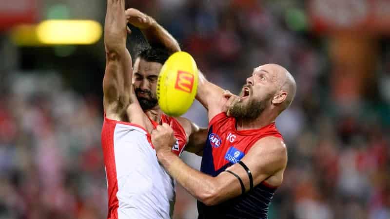 Grundy, Swans surge past Melbourne in AFL season opener