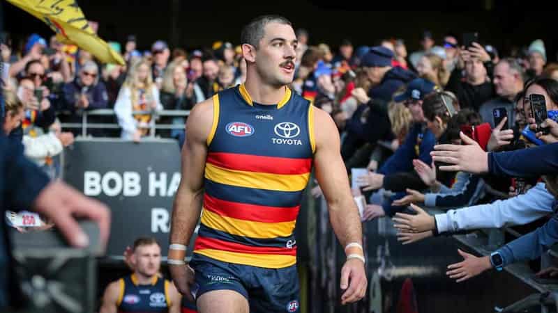 Crows star Walker battles back ailment ahead of opener