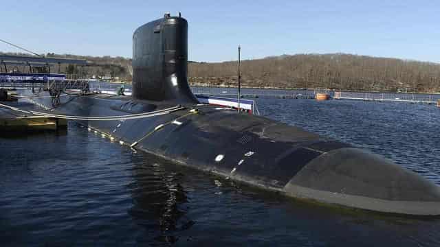 Biden bid to cut submarine 'no fatal blow' to Australia