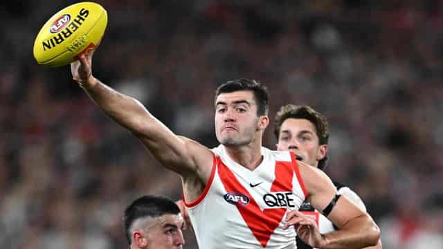 Magpies still winless as slick Swans end MCG hoodoo