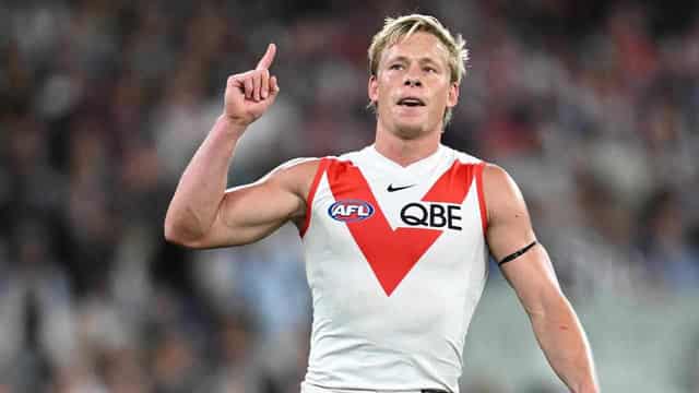 Longmire heaps praise on versatile Swans star Heeney