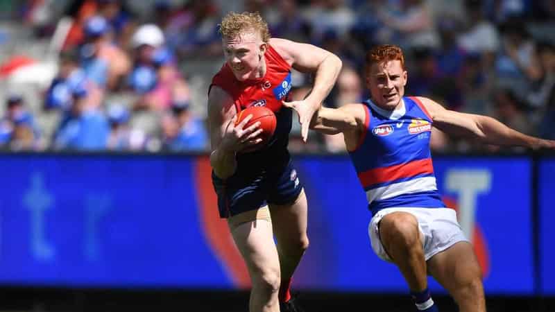 Demons welcome back a hero in win over Bulldogs