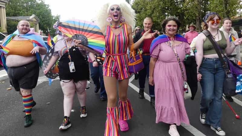 Orange becomes part of the rainbow in pride celebration