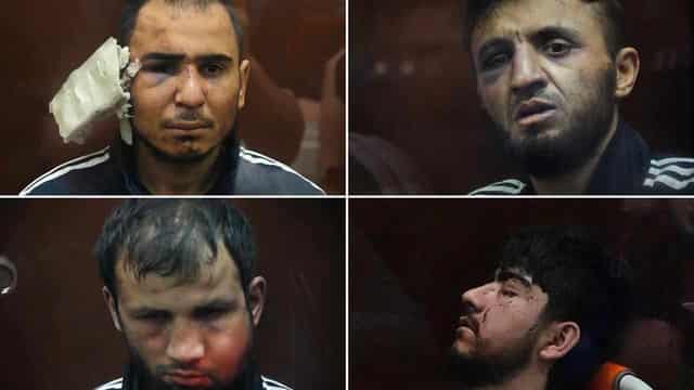 Battered suspects in Russia hall attack admit guilt