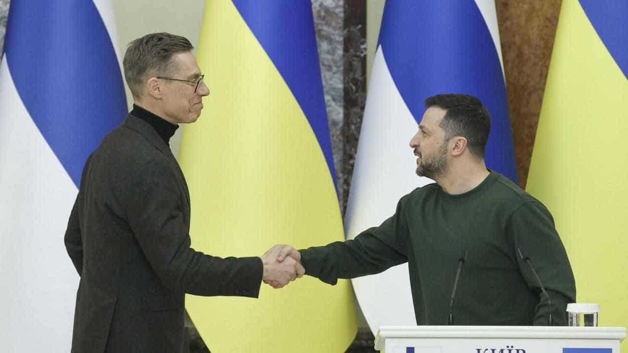 Ukraine signs Finland deal, warns of Russia troop plans