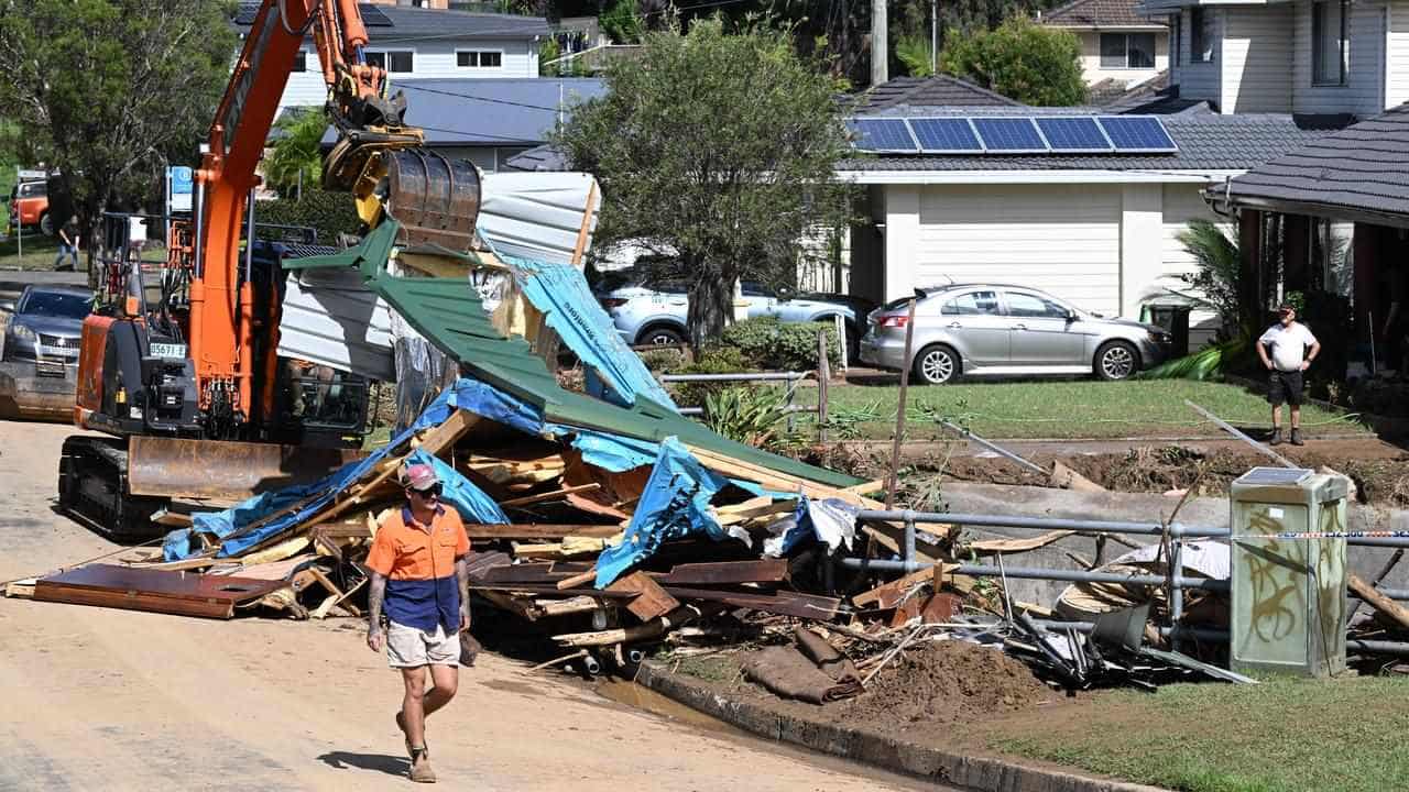 Body found as flooding forces 168 rescues across NSW