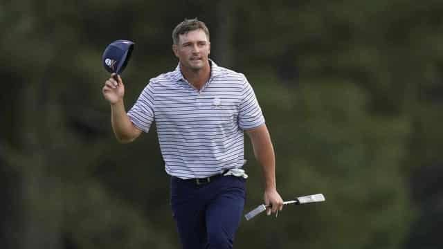 DeChambeau claims Masters lead with birdie blitz