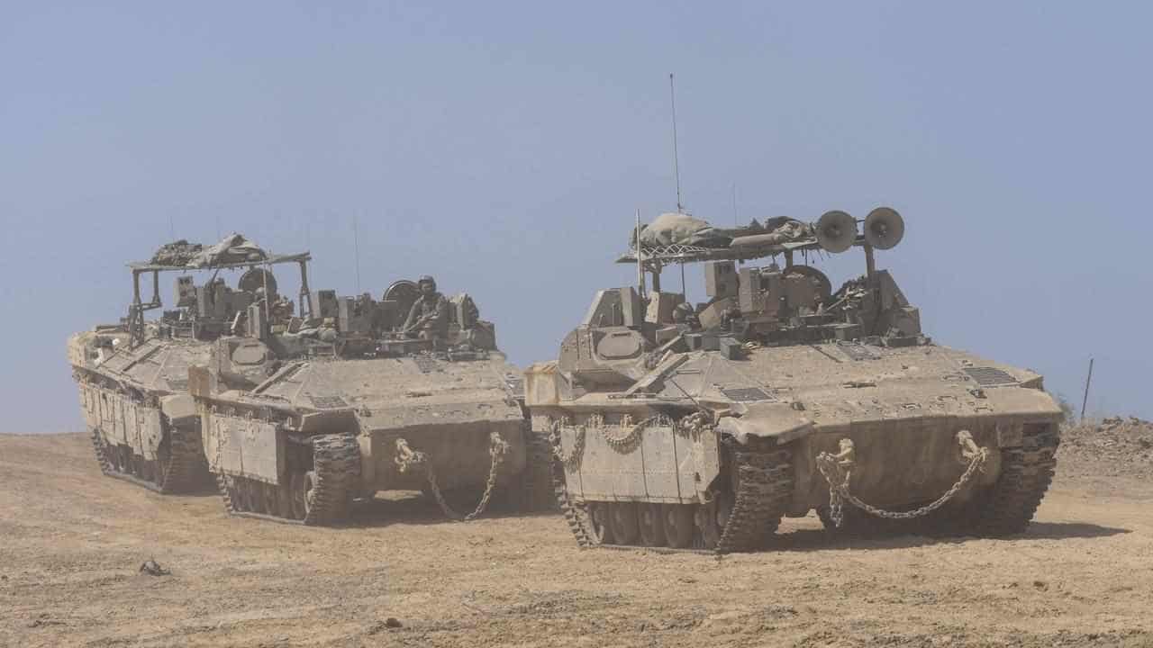 Israeli tanks push back in Gaza's north, jets hit Rafah