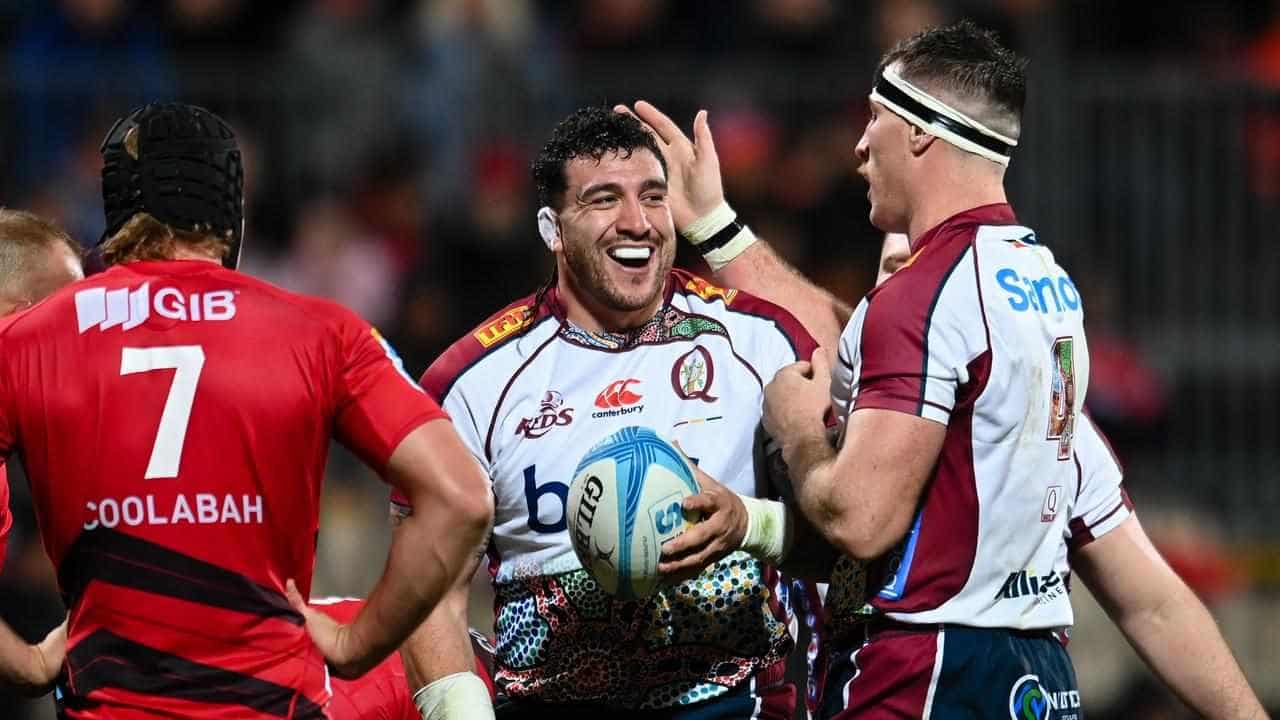 Reds hold off Crusaders to end 25-year Super drought