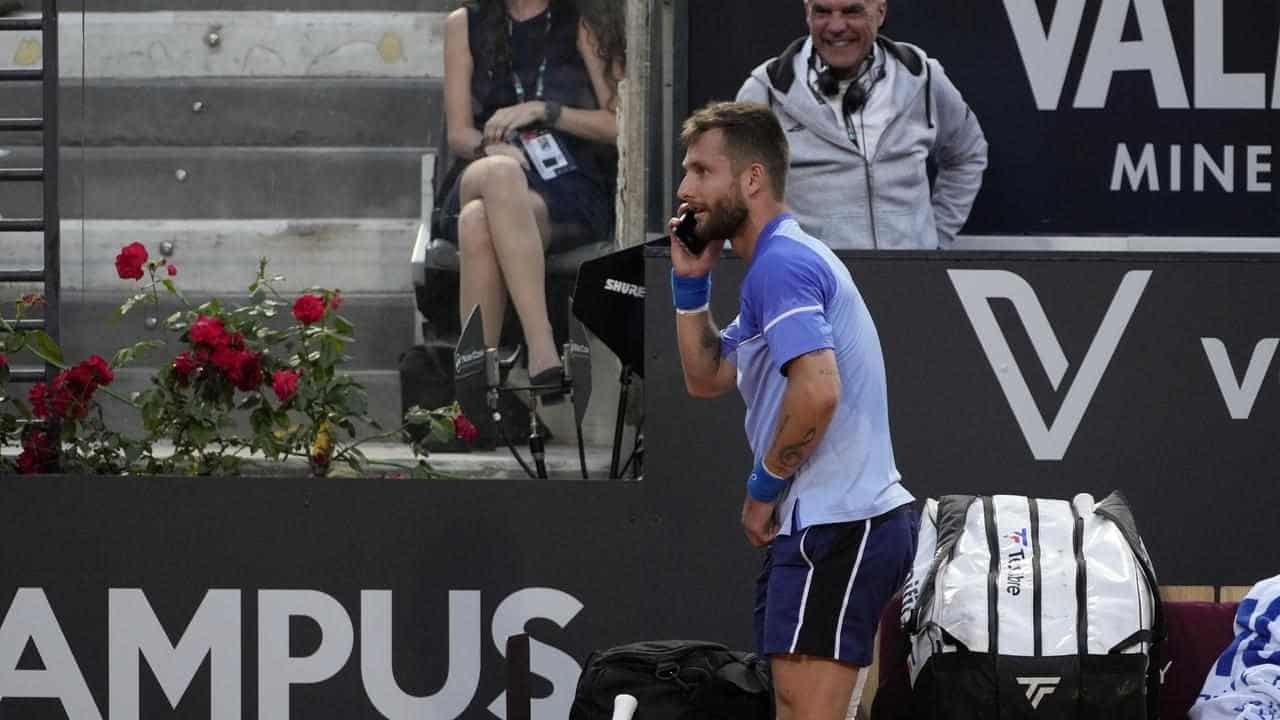 Djokovic hit by bottle as Aussies take Roman blows too