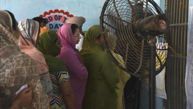 Indians vote in final phase of poll amid searing heat