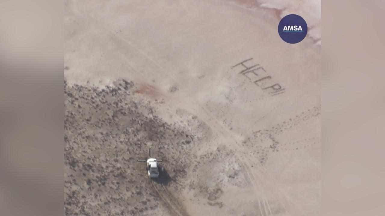 Stranded teens rescued after pilot spotted SOS in sand