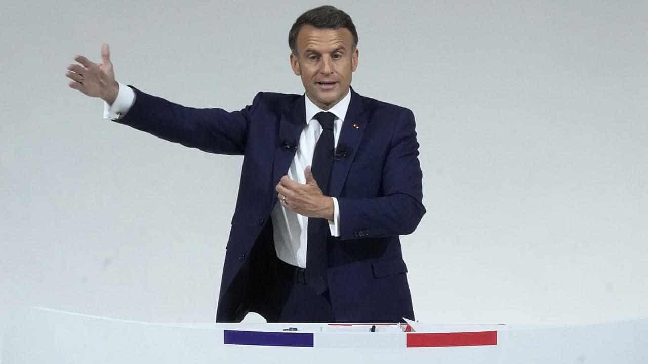 France's Macron asks rivals to unite against far right