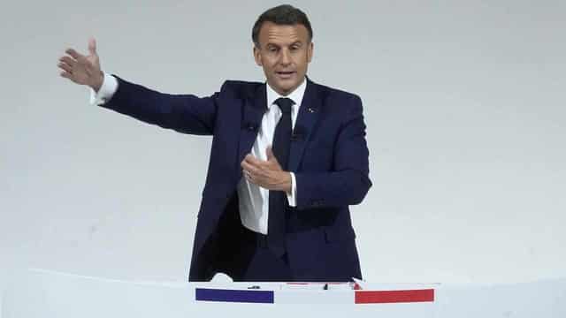 France's Macron asks rivals to unite against far right