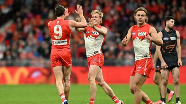 Giants keep focus on AFL flag despite Swans drubbing