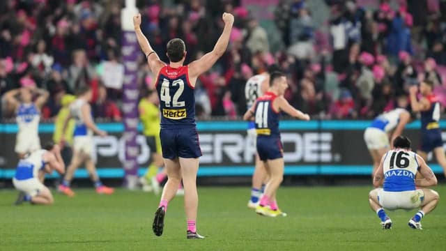 Roos' comeback falls short as Dees win fiery AFL clash