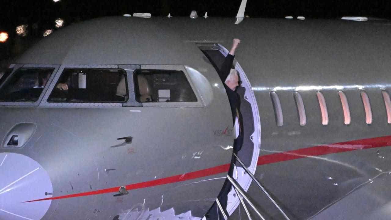 Assange lands in Australia after US guilty plea